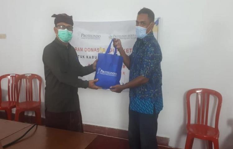Serah Terima 84 Paket Sembako dari Protelindo Area Balinusra